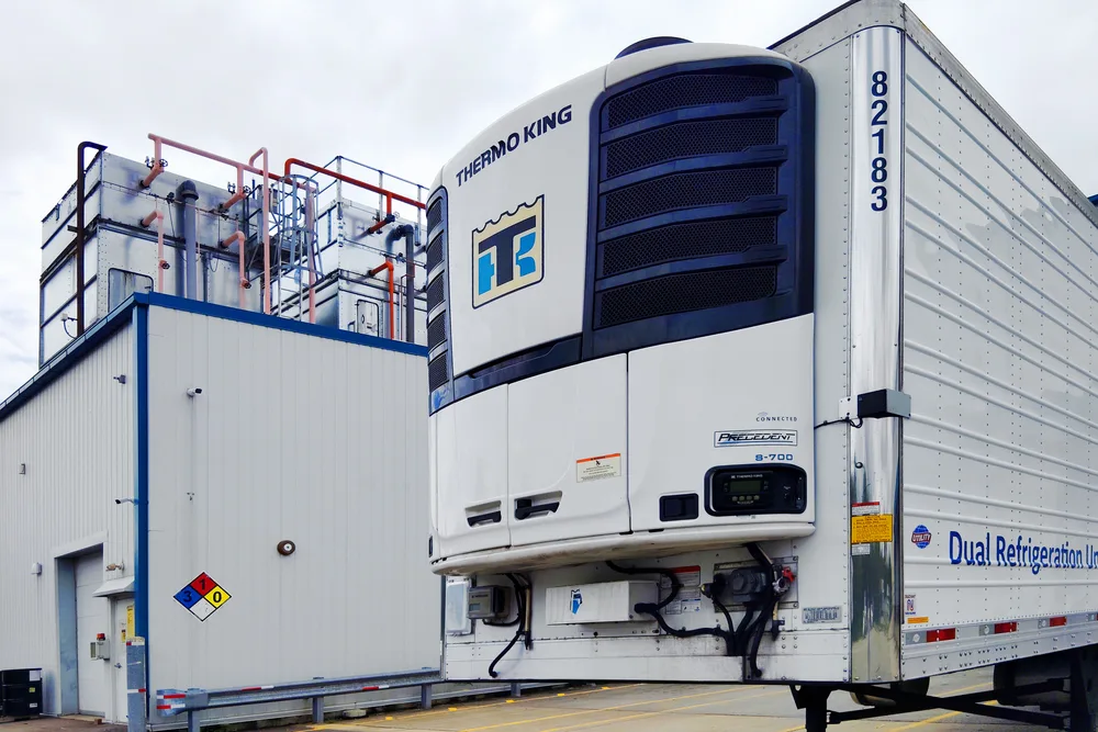 The Thermo King dual refrigeration unit on a Bio Pharma Logistics trailer at the Louisville dock, alongside the facility's refrigeration plant
